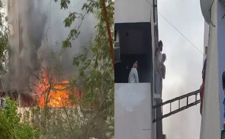 शोरूम में लगी आग, पड़ोसियों ने सीढ़ियां जोड़कर बचाई कई लोगों की जान